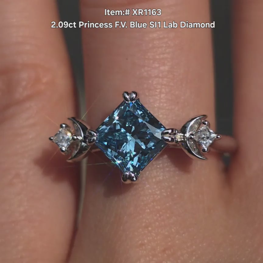 DovEggs Princess blue lab diamond ring sparkling in sunlight video