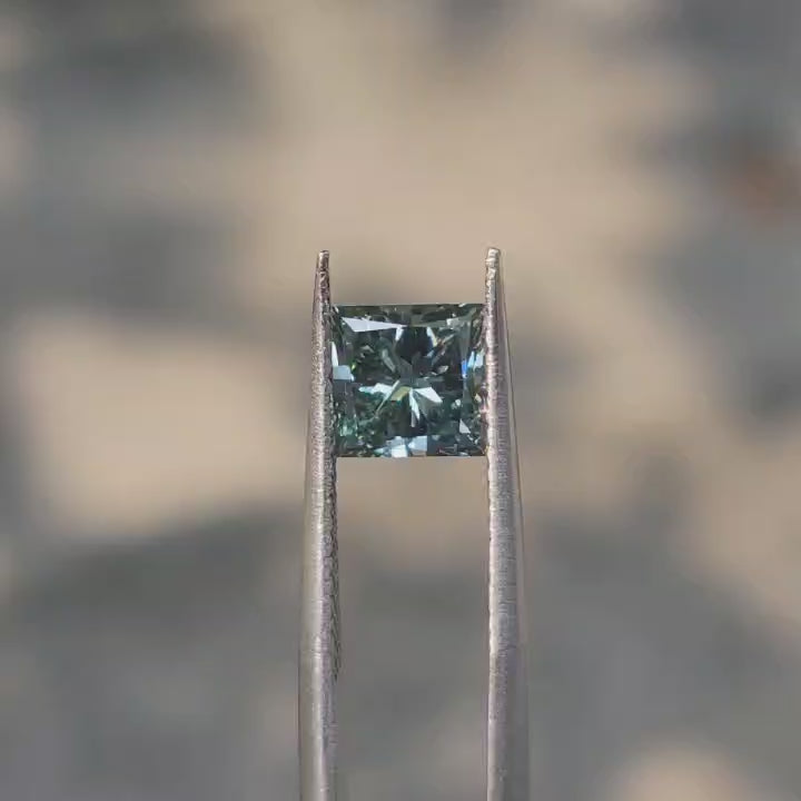 video of 2.09ct princess-cut green lab diamond (VVS clarity) displaying vivid color and precision faceting