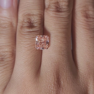 video showing 2.02ct pink diamond's facet precision under warm lighting
