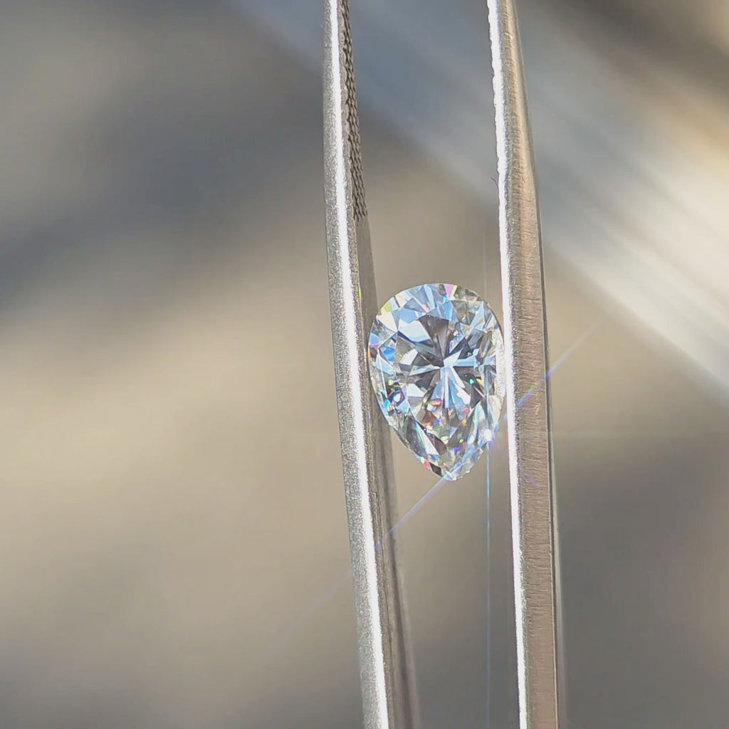 Doveggs Crown Arrow Cut Pear Moissanite Loose Stone in Sunlight