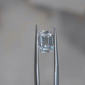 Daylight video of 2.297ct emerald cut's icy D color and step-cut clarity