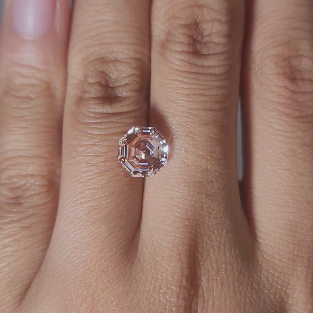 Designer jewelry video of 2.56ct pink octagon diamond in studio lighting
