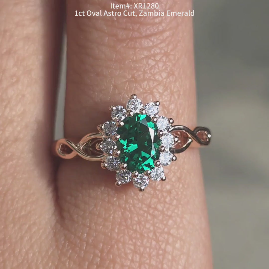 DovEggs Oval AStro cut zambia emerald ring sparkling in sunlight video.