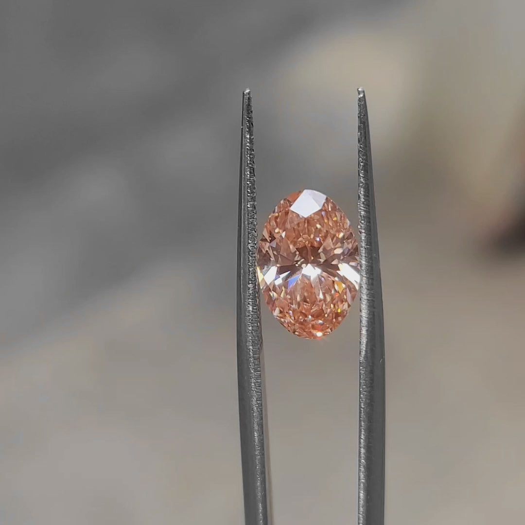 2.62ct Oval lab diamond radiating pink brilliance in sunlight