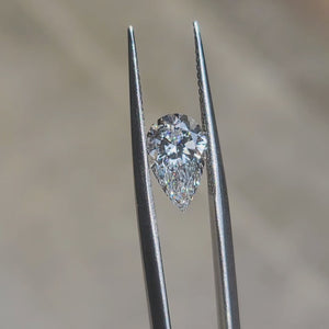 "Outdoor sunlight video highlighting 1.92ct pear cut’s sparkle and E color purity"