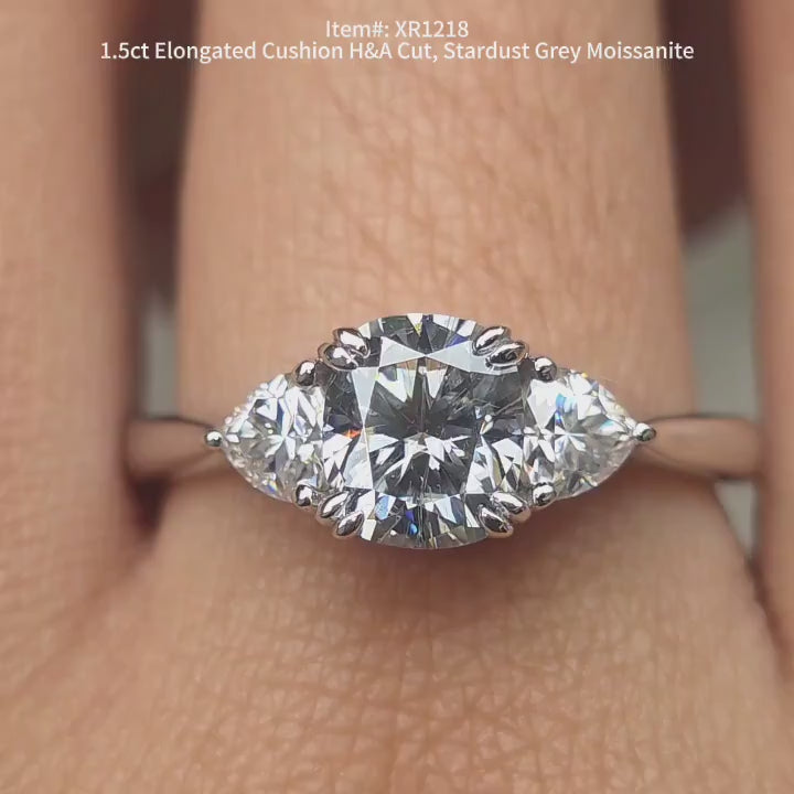 DovEggs stardust grey elongated cushion with trillion side stones moissanite engagement ring video