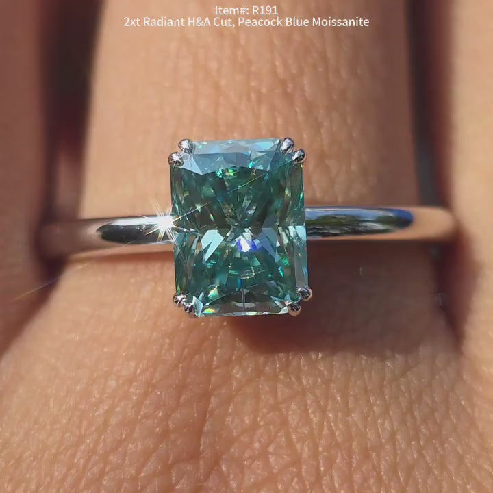 Doveggs radiant peacock blue moissanite engagement ring video in sunlight