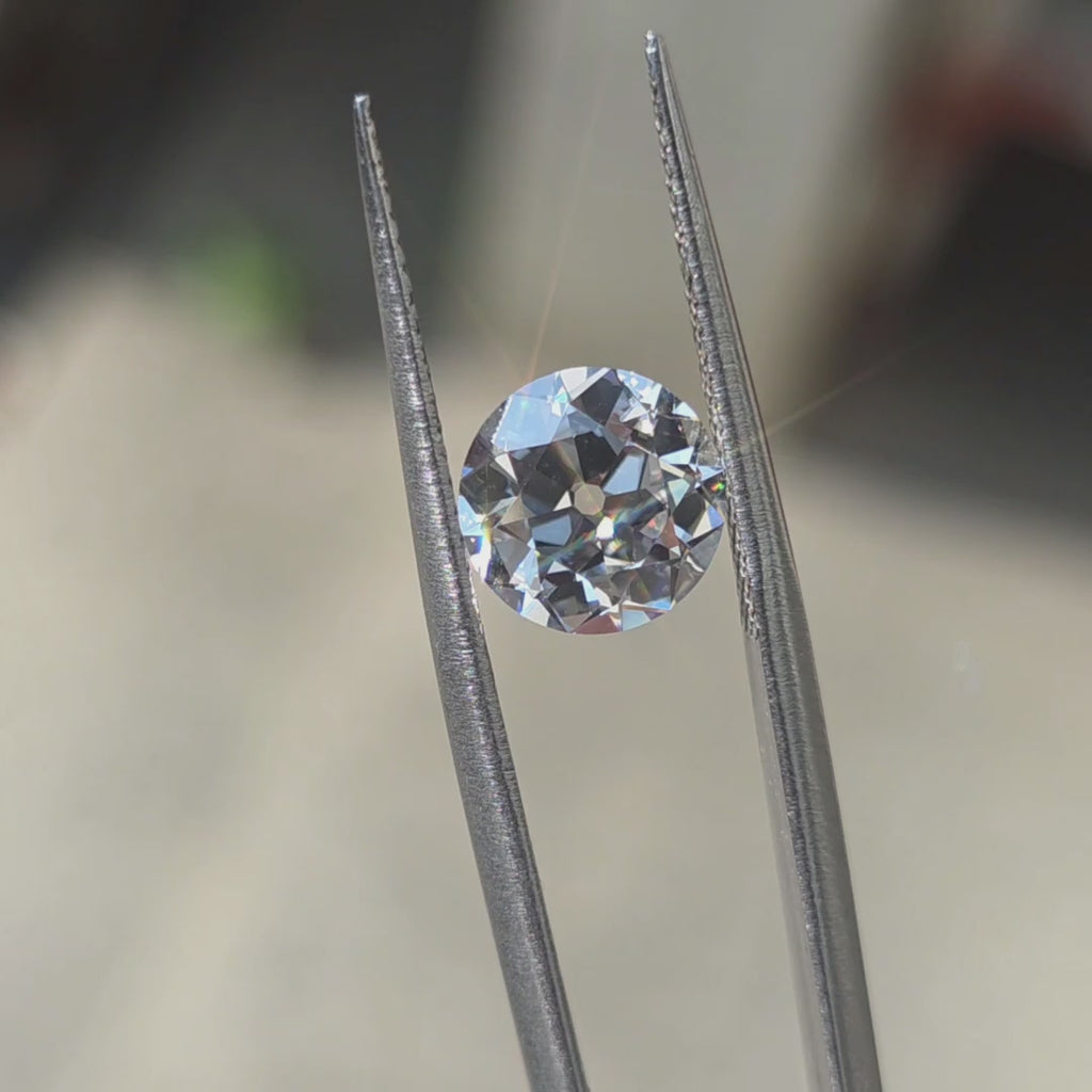Outdoor sunlight highlights the cut of a 2.51ct round European cut lab diamond.
