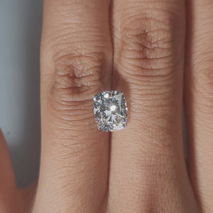 Hand-display video of 2.02ct cushion diamond in warm home lighting