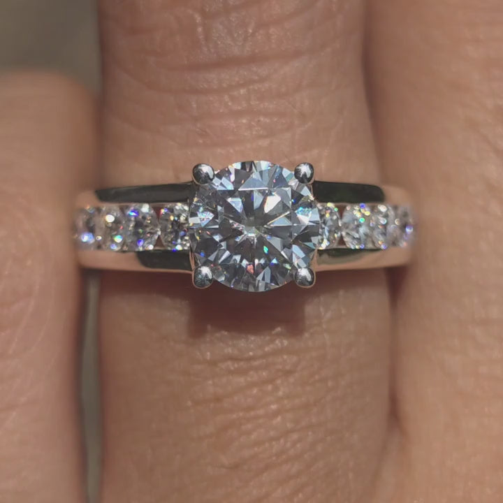 DovEggs 1ct Round H&A cut moissanite engagment ring sparkling in sunlight video