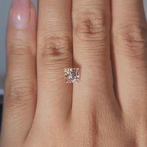 Hand comparison with same-size natural diamond