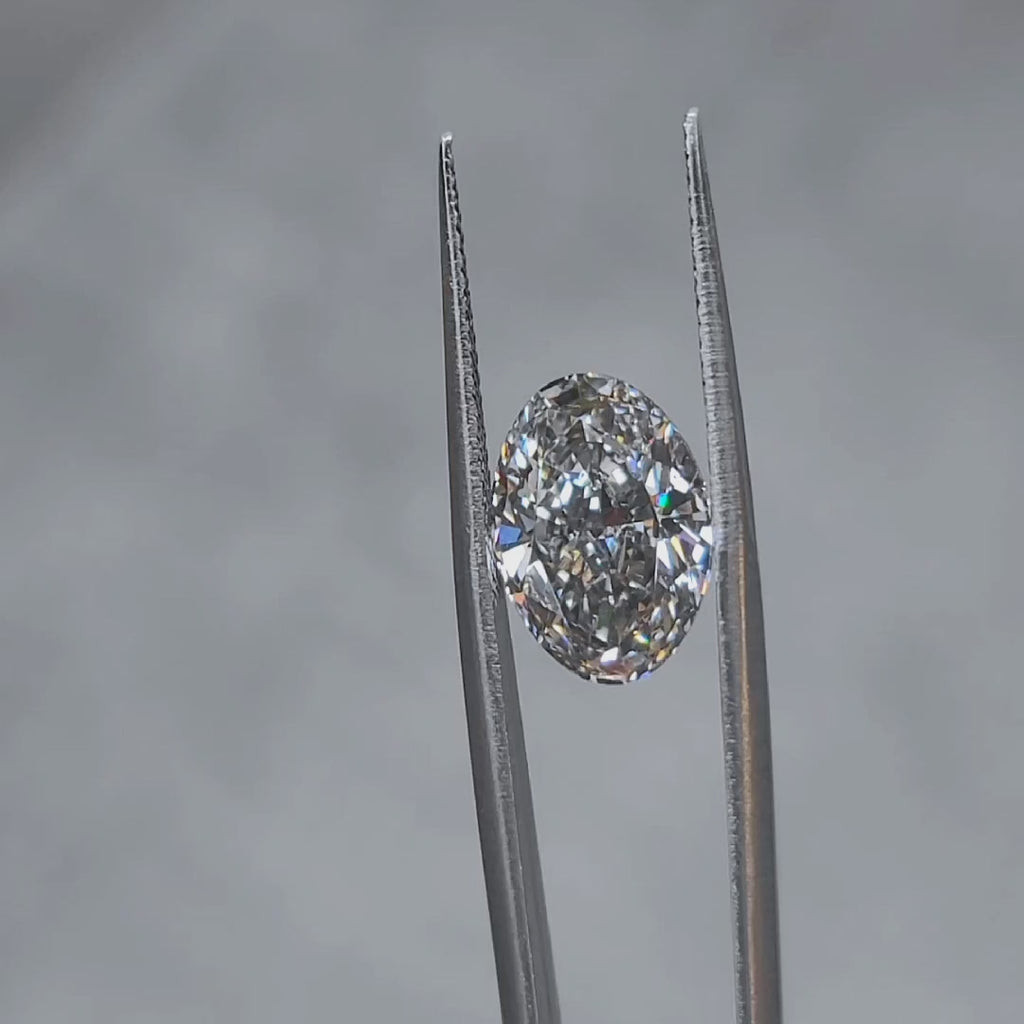 5.00ct oval fancy dark gray diamond in natural light, showing unique color saturation