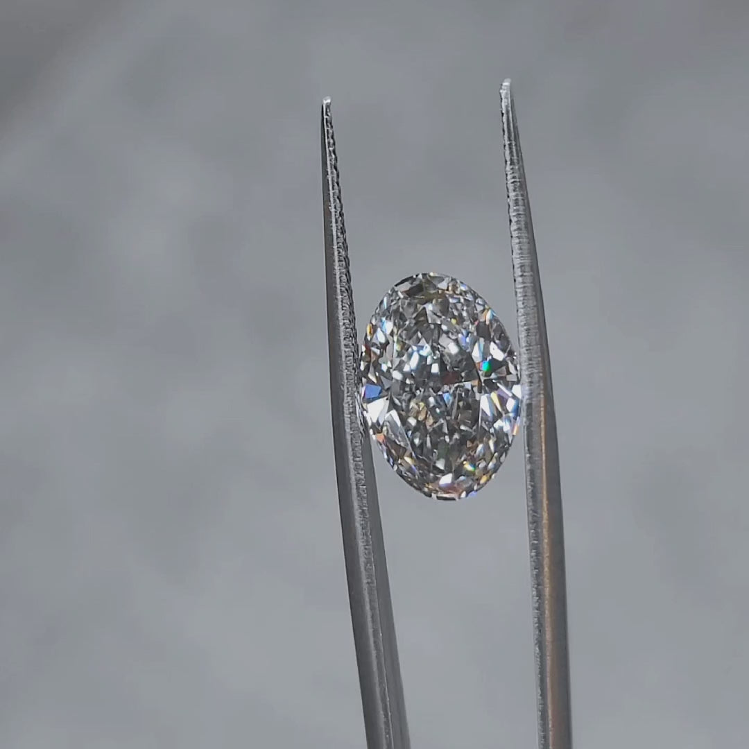 5.00ct oval fancy dark gray diamond in natural light, showing unique color saturation