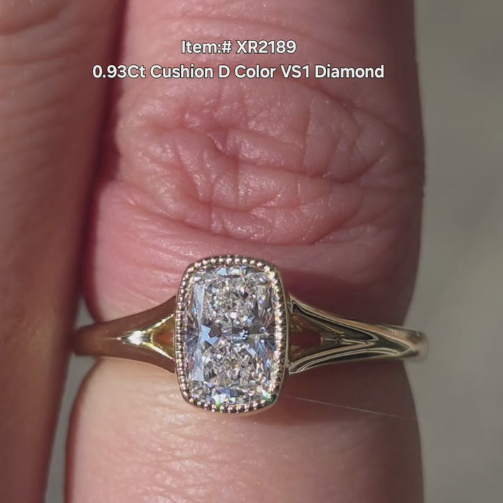 DovEggs Cushion Lab Grown Diamond Ring with bezel setting sparkling in sunlight video.