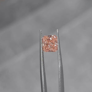 2.02ct radiant cut vivid pink diamond's color saturation in natural sunlight