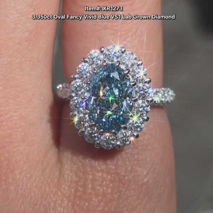 DovEggs Oval lab diamond engagement ring sparkling in sunlight video.