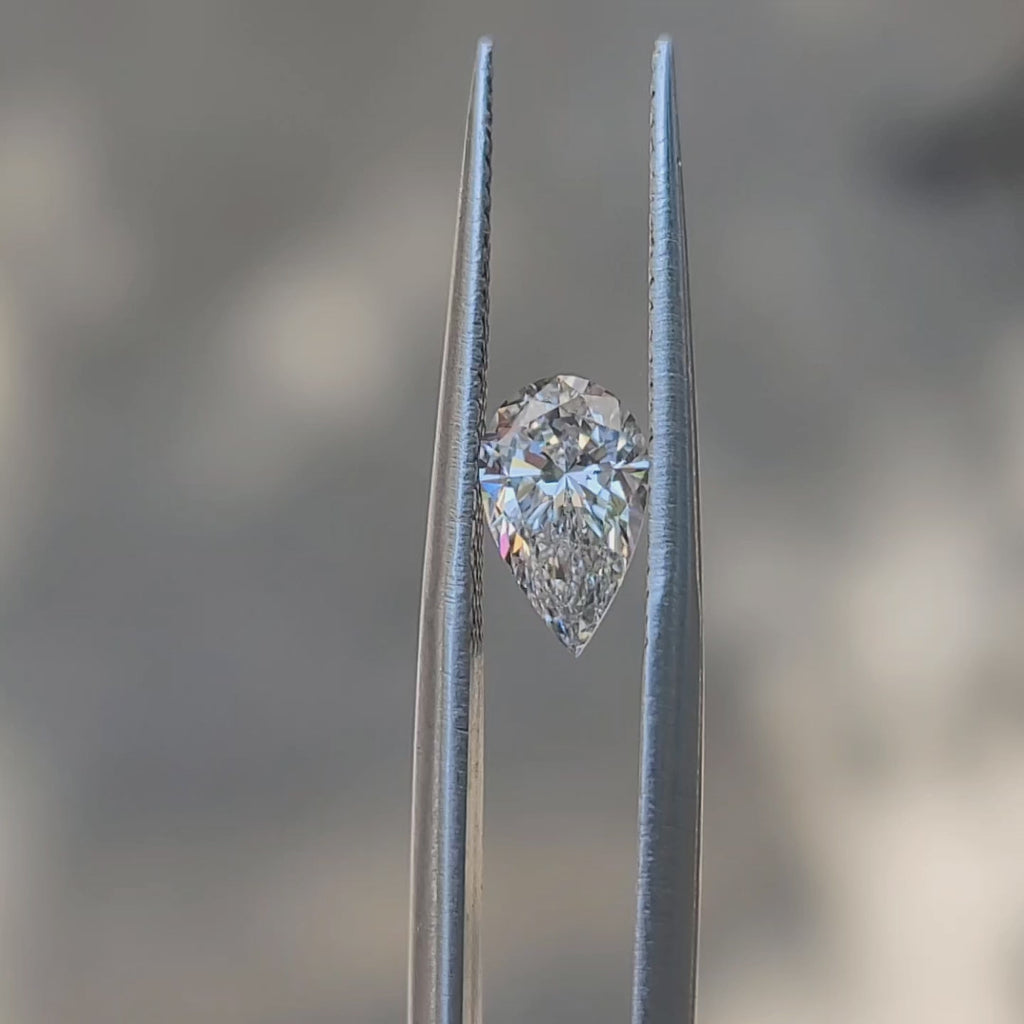 "Sunlight video showing 1.01ct pear cut diamond's teardrop brilliance"