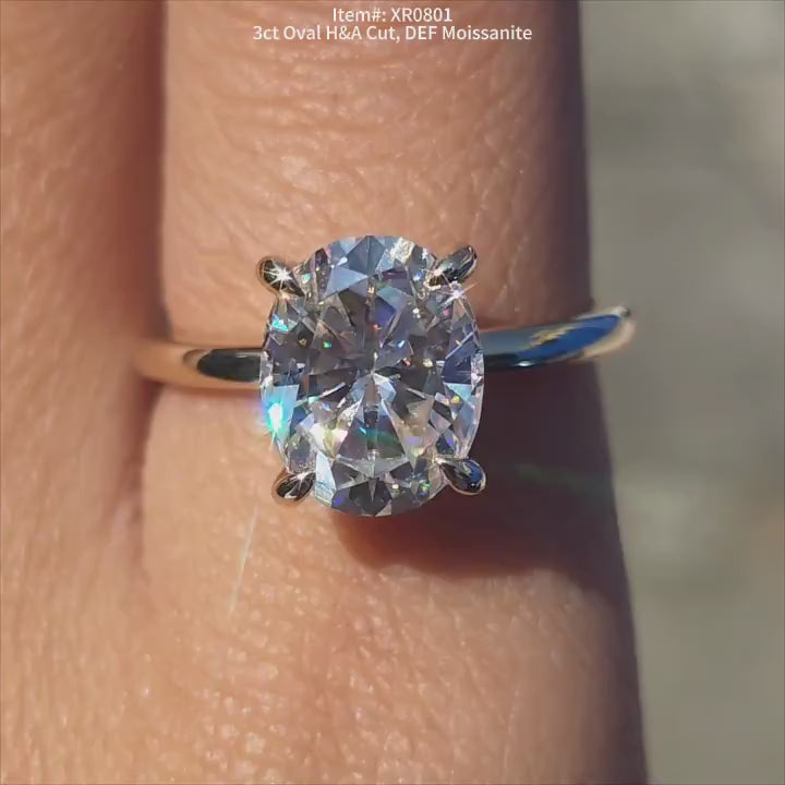 DovEggs 3ct oval hidden halo moissanite engagement ring in sunlight
