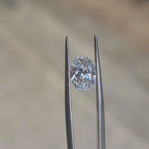 "Sunlight video showcasing 1.59ct oval cut lab diamond’s brilliance and D color clarity"