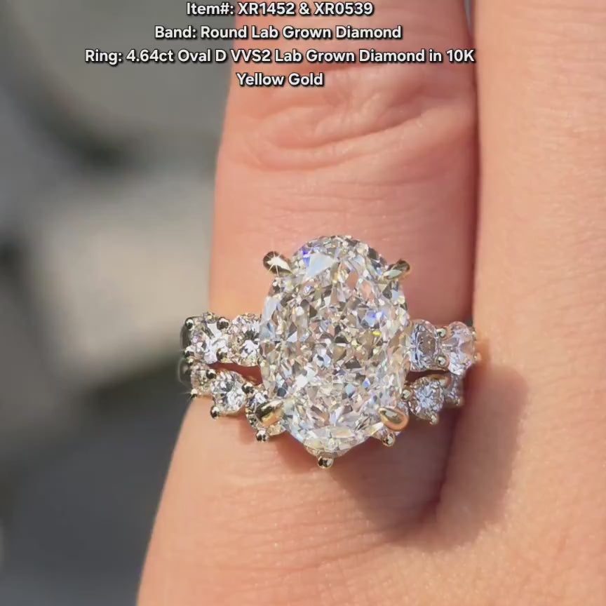 DovEggs oval lab diamond with pave stones engagement ring video in sunlight