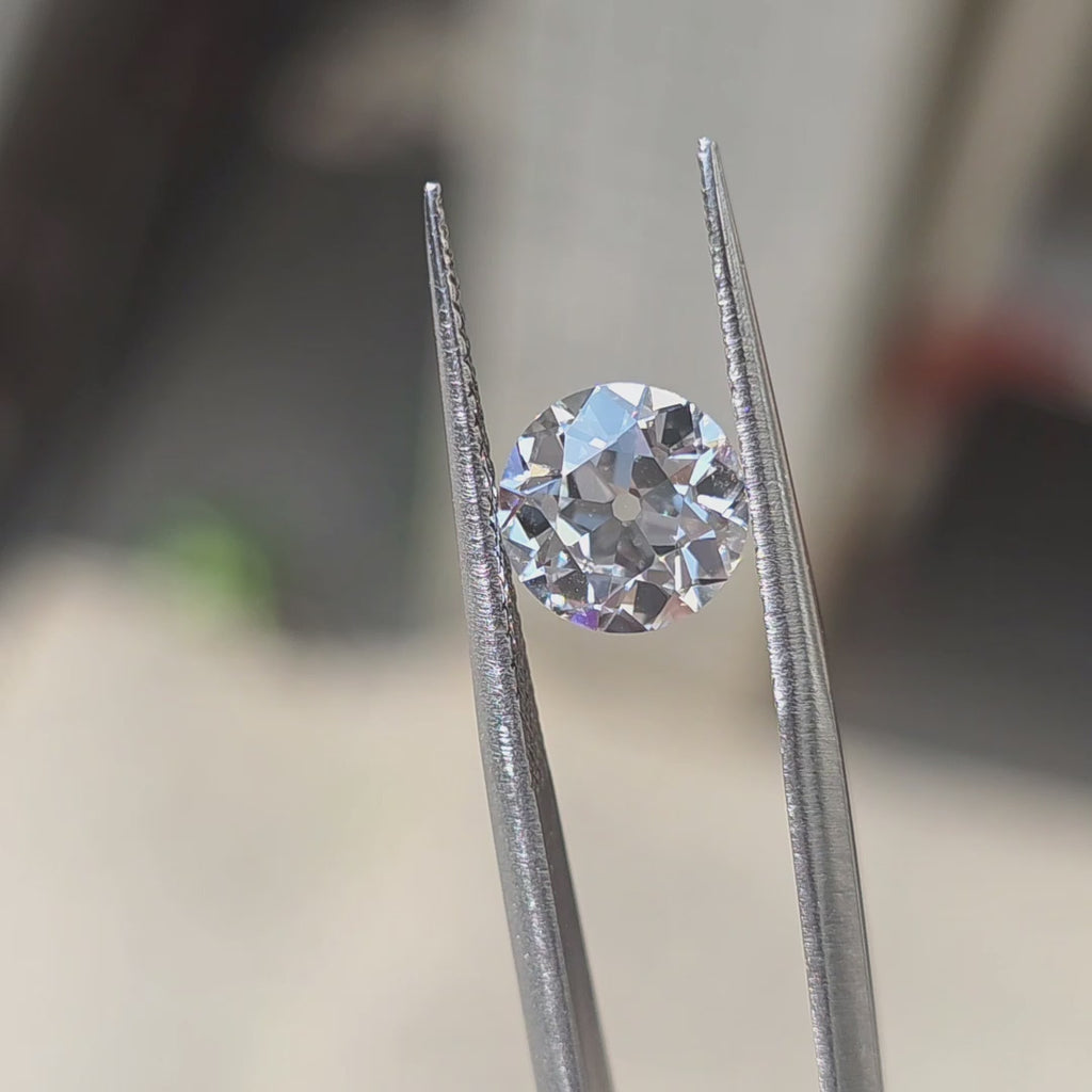 See a 2.10ct round European cut lab diamond sparkle beautifully in the sun.