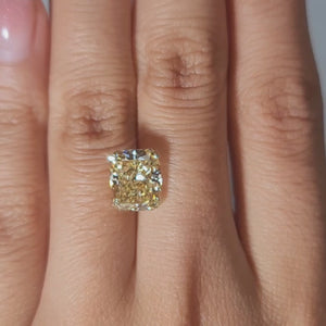 Close-up hand modeling showing diamond's size and sparkle