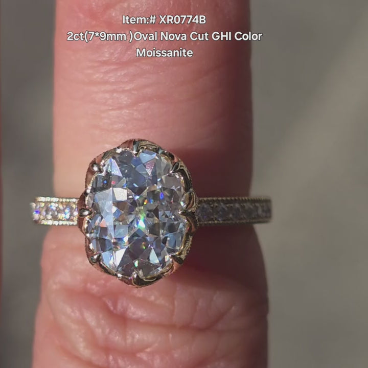 DovEggs 2ct Oval Nova cut moissanite ring sparkling in sunlight video.