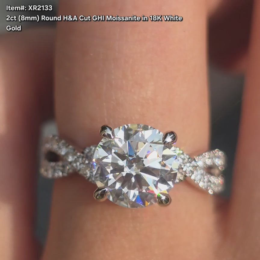 DovEggs GHI color H&A round moissanite ring sparkling in sunlight video