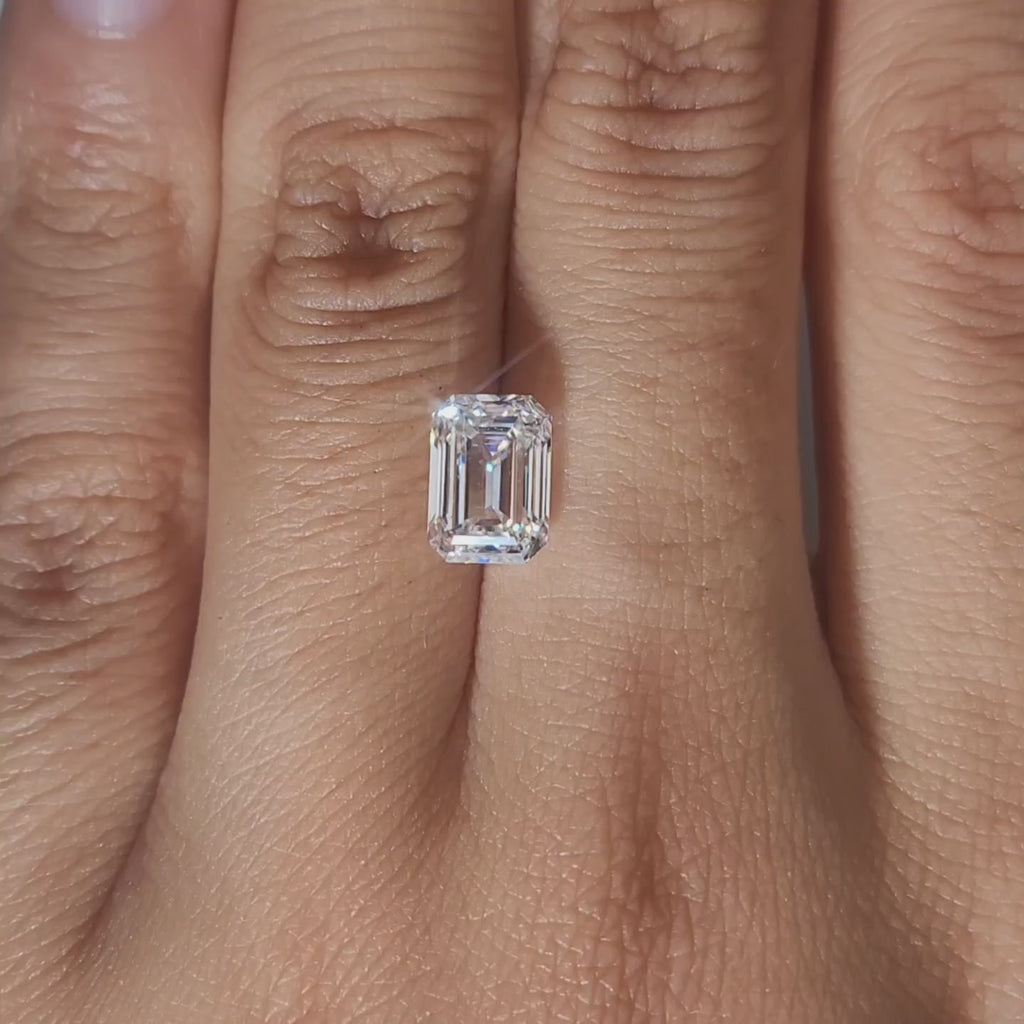 Finger-modeled video of 2.062ct diamond under candlelight