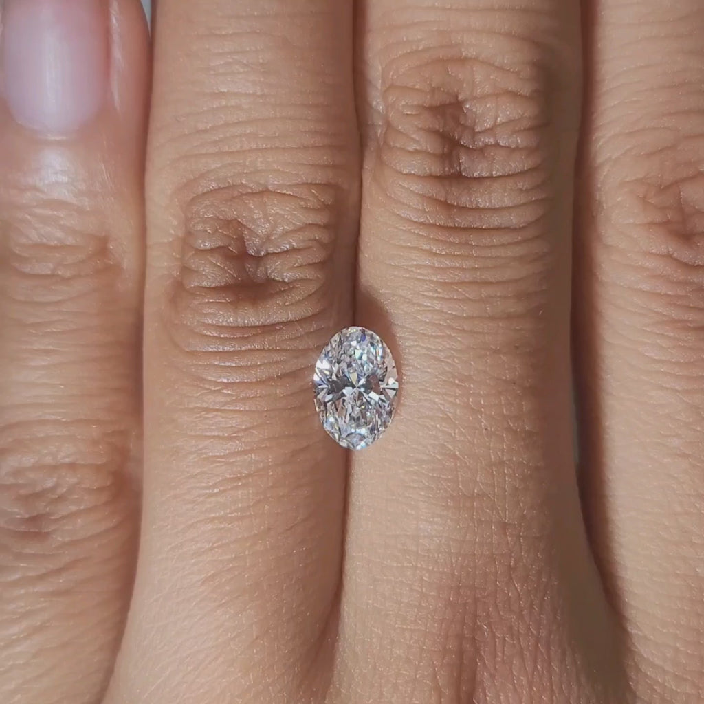 Modeled video showing 1.04ct oval diamond in evening indoor light