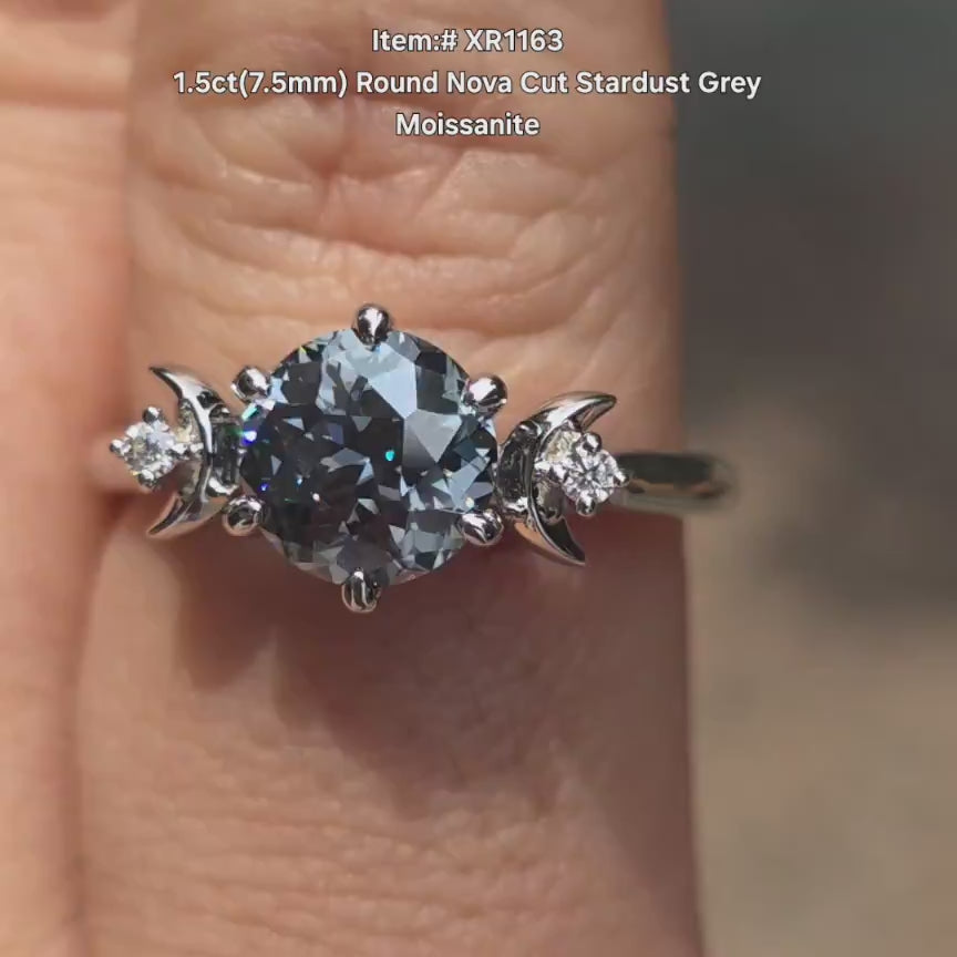 DovEggs half moon round nova cut stardust grey moissanite engagement ring in sunlight