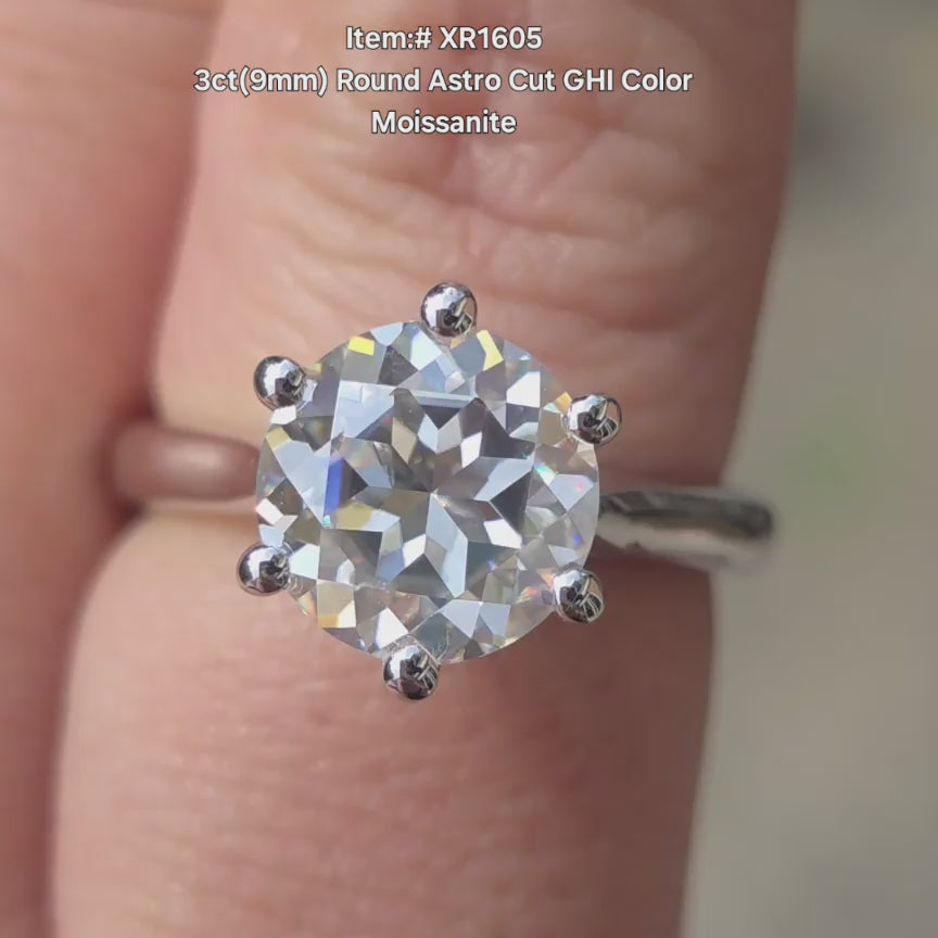 DovEggs Astro round moissanite ring sparkling in sunlight video.