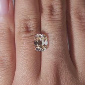 Romantic warmight video of 2.73ct orange cushion diamond on finger