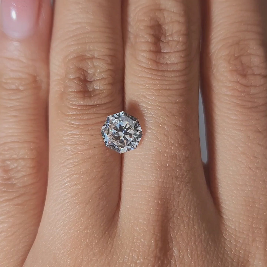 Hand-worn video of 2.01ct octagon diamond in warm lighting, perfect for vintage-inspired rings