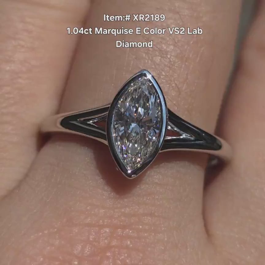 DovEggs solitaire bezel marquise lab diamond engagement ring video