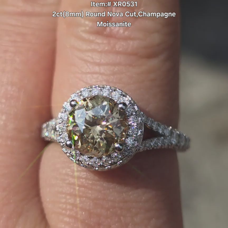 DovEggs Nova round Champagne moissanite ring sparkling in sunlight video