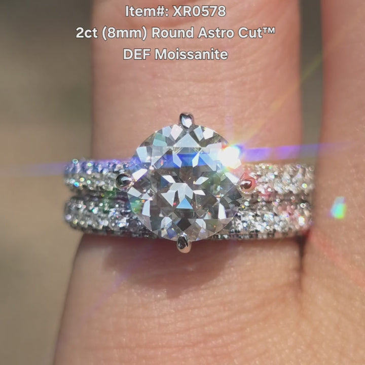 DovEggs Round Astro cut moissanite ring sparkling in sunlight video.
