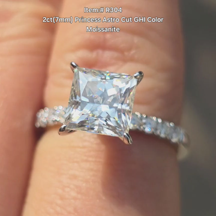 DovEggs 2ct princess astro cut moissanite  engagement ring with pave setting on hand outside video.