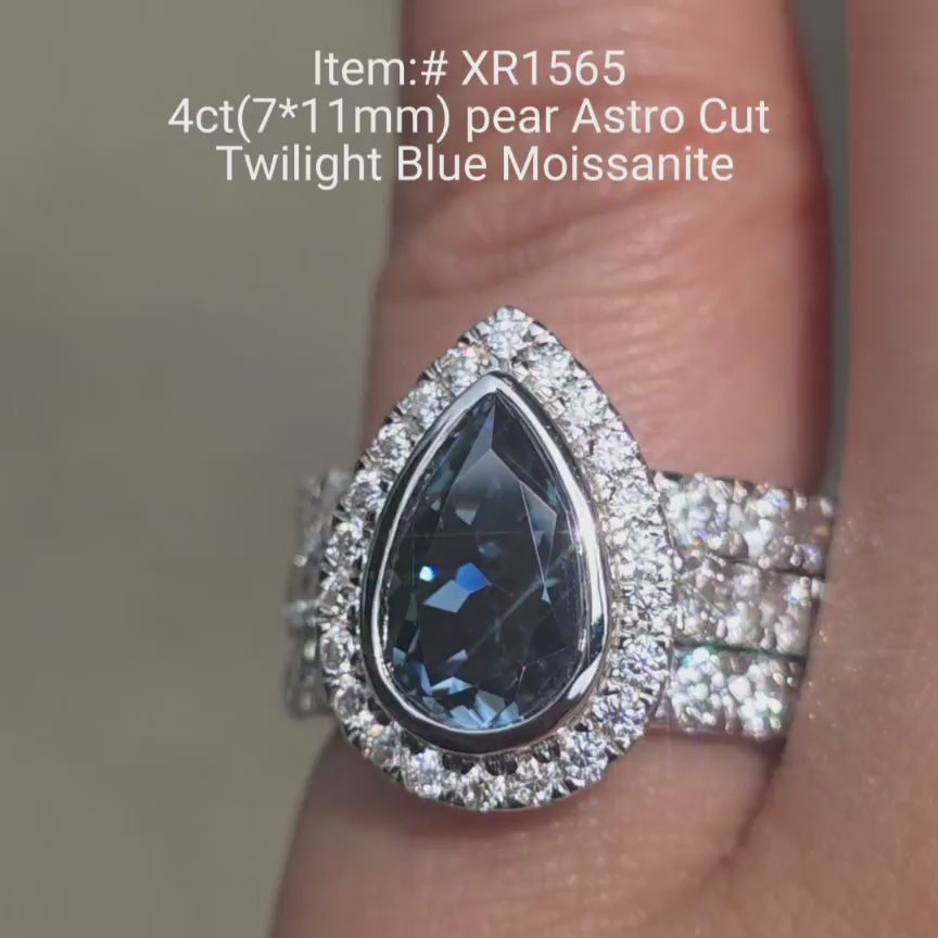 DovEggs Astro Pear Twlight Blue moissanite ring sparkling in sunlight video
