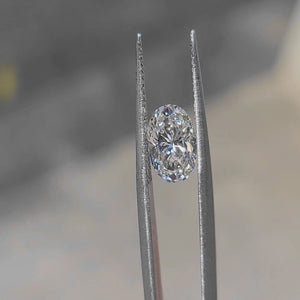 2.05ct oval lab diamond (E/VVS2) in sunlight, showing brilliant sparkle with minimal bow-tie