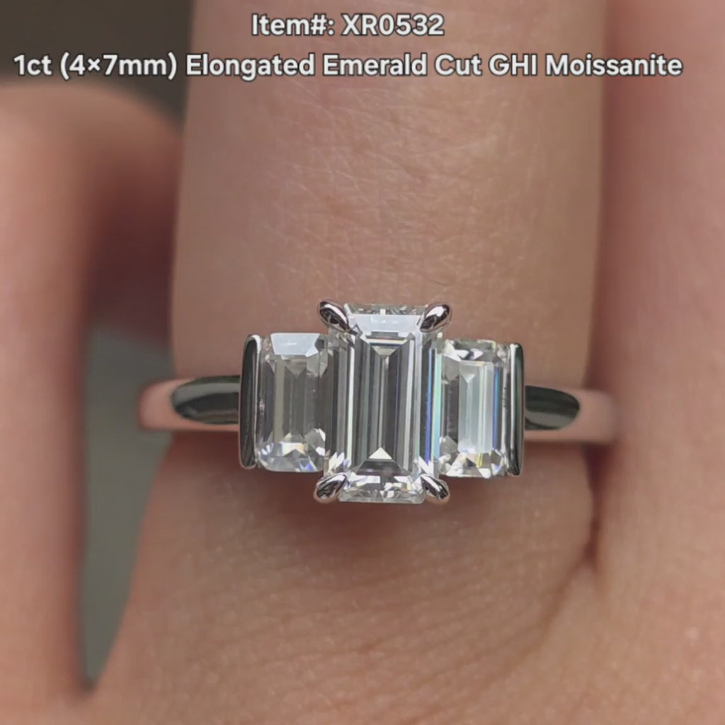 DovEggs Elongated Emerald cut moissanite engagement ring on hand video.