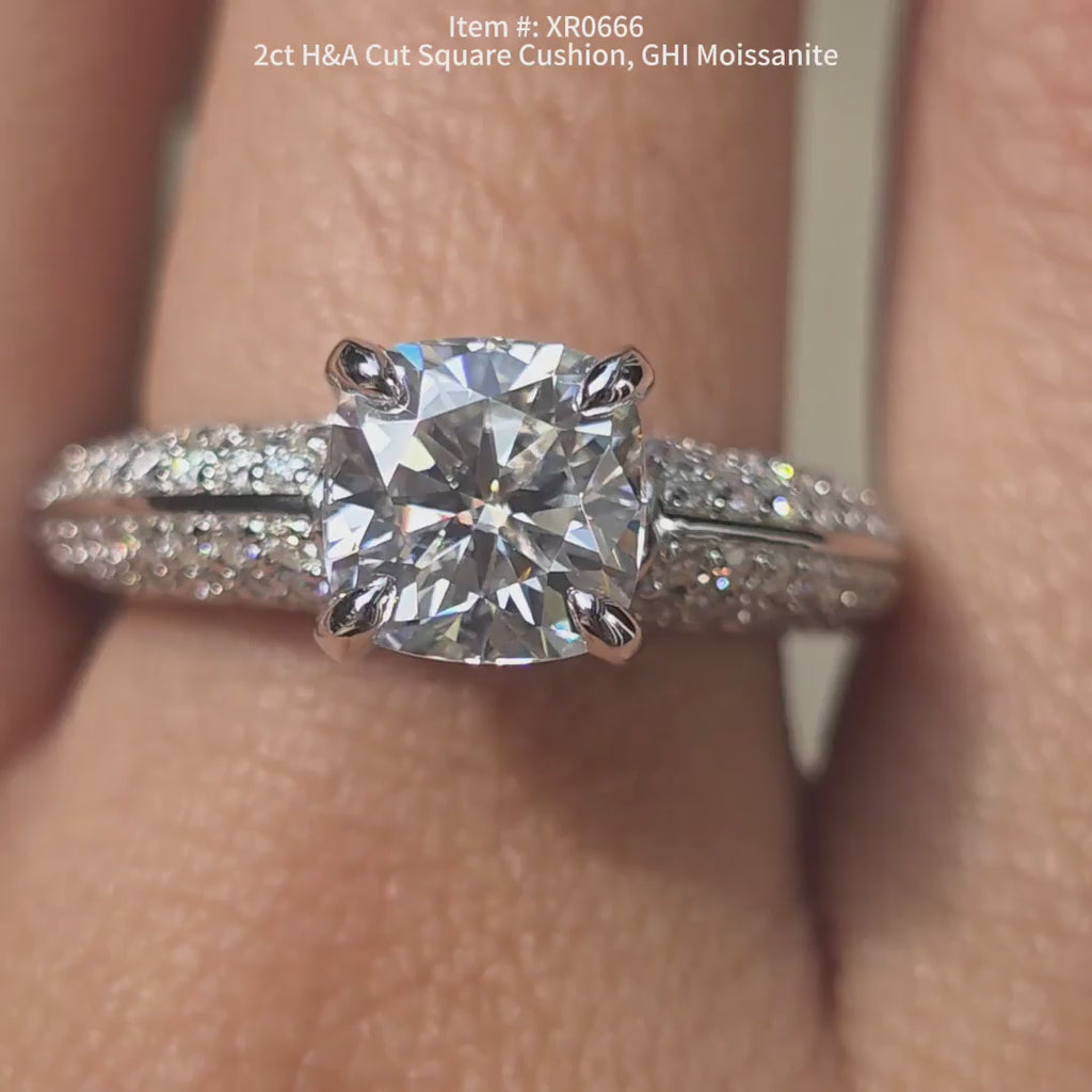 DovEggs Square cushion gHI color moissanite ring sparkling in sunlight video.
