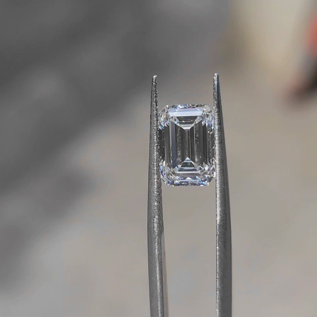 3.06ct emerald lab diamond (D/VS1) in sunlight, showcasing clean step-cuts