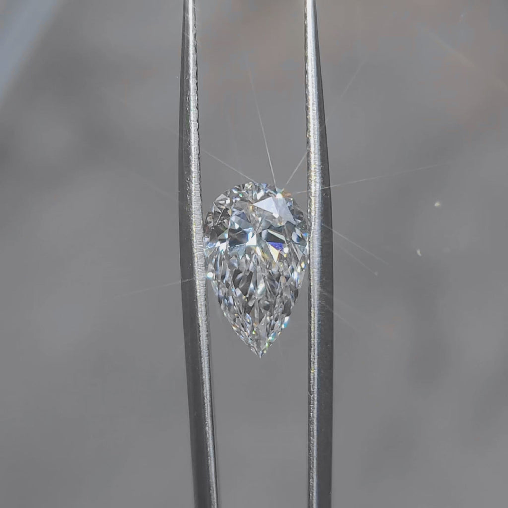 "Sunlight video showing 3.137ct pear cut diamond's elegant sparkle"