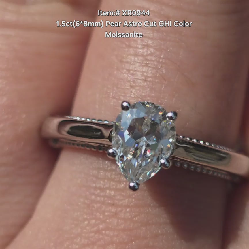 DovEggs Astro Pear GHI color moissanite ring sparkling in sunlight video