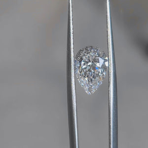 Sunlight video highlighting 2.166ct pear cut's teardrop shape and F color