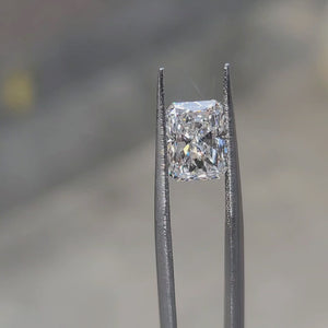 3.03ct radiant lab diamond (F/VVS2) outdoors, showcasing fiery brilliance