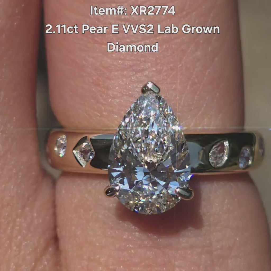 DovEggs pear art deco lab diamond engagement ring video in sunlight