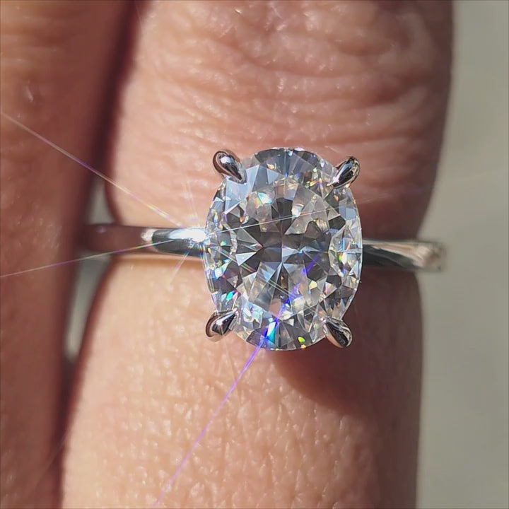 2ct Oval Crushed lce Cut DEF Moissanite in sunlight