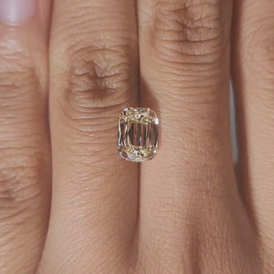 Finger video of 2.092ct elongated cushion cut in indoor lighting
